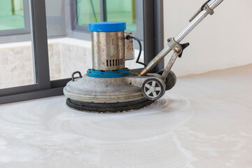 Machine for scrubbing floors to clean.