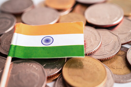 Stack of coins money with India flag, finance banking concept.