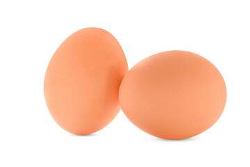 Two chicken eggs isolated on a white background.