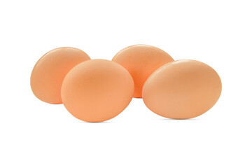 Four chicken eggs isolated on a white background.