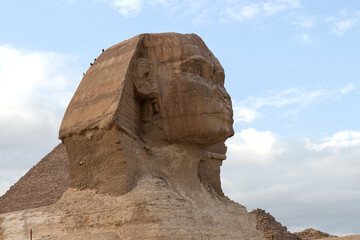 Fototapeta na wymiar Egypt. Giza. View of the Sphinx next to the pyramids.