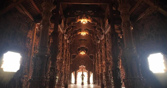 Interior Sanctuary of Truth (Prasat Sut Ja-Tum), beautiful wooden temple by the sea on the outskirts of Pattaya Thailand, Amazing Thailand travel concept.