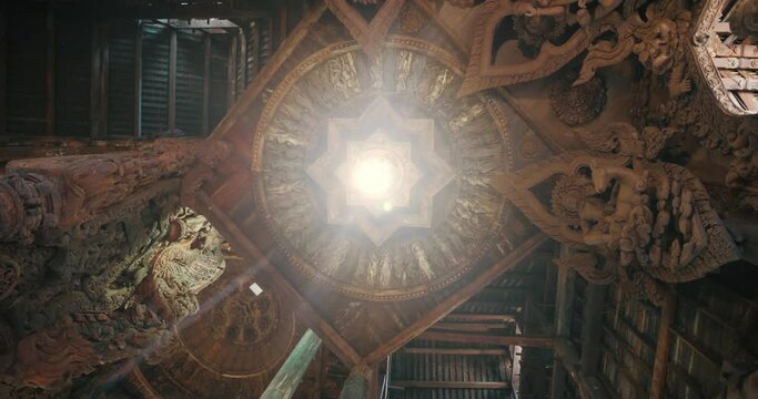 Interior Sanctuary of Truth (Prasat Sut Ja-Tum), beautiful wooden temple by the sea on the outskirts of Pattaya Thailand, Amazing Thailand travel concept.