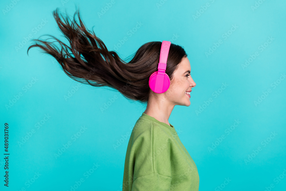 Sticker Profile photo of positive cheerful lady look empty space toothy smile isolated on teal color background