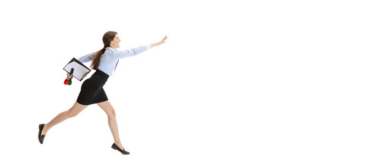 Be late for an interview. Female journalist holding reporter microphone running isolated on white...