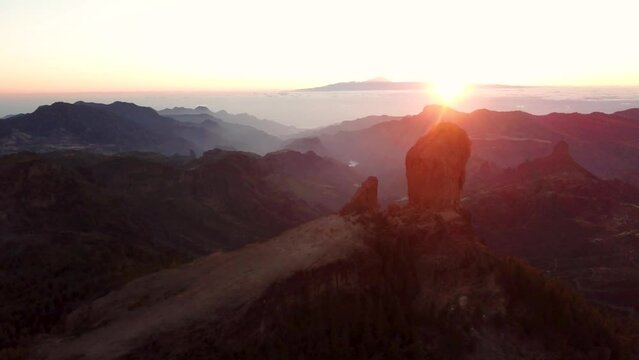 Aerial drone view of sunset at Roque Nublo, Gran Canaria Spain