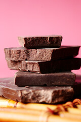dark chocolate on a plate on table close up 