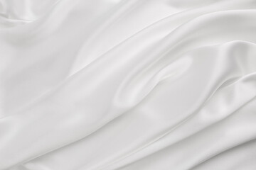 Elegance white satin silk with waves, abstract background luxury cloth, elegant wallpaper design....