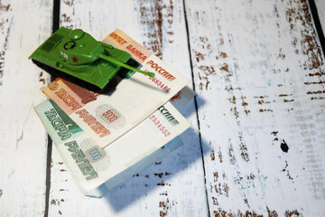 toy tank on the russian banknote 5000 and 1000 roubles crisis risk sanctions wallpaper