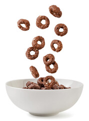 Dry breakfast chocolate rings falling into a plate on a white background. Isolated