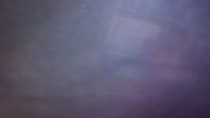 Obraz na płótnie Canvas Blurred abstract background of green, white, black, red, orange and purple.