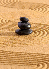 Fototapeta na wymiar Jaanese ZEN garden with stone in textured sand