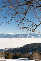 Mist of fog over the swiss and austrian mountains