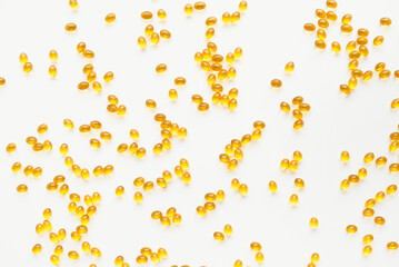 Vitamins d3 on a white background. Fish fat.