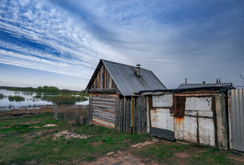 Photo of an old house in a remote area