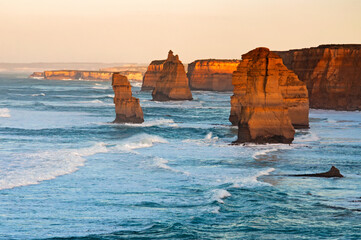 Sunrise over Twelves Apostles in Great Ocean Road, Victoria, Australia. The Twelve Apostles is a...