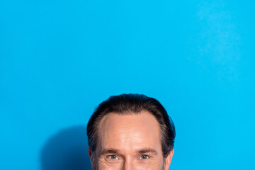 Close up cropped photo of funky positive man promoting barbershop shampoo brand isolated on blue color background