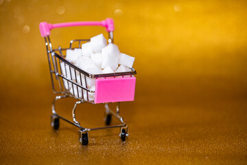 Small shopping cart with sugar cubes