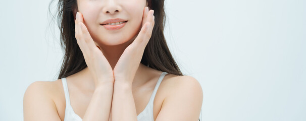 Beauty image of a woman with moist skin