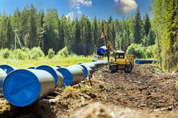Fototapeta na wymiar Construction machinery on the pipeline construction