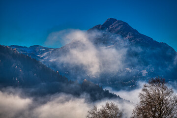 winterly landscape with snowcoverd mountains in the Austrian Alps in the region of Saalfelden  near Zell am See in Salzburg, Austria