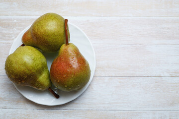pears on a plate on the table
