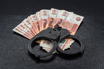Russian banknotes with handcuff