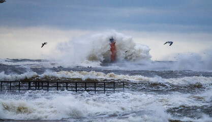 Big storm near a lighthouse