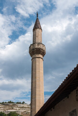 Fototapeta na wymiar Minaret of Big Khan Mosque of 1532 of Bakhchisaray Palace, Bakhchisarai, central Crimea