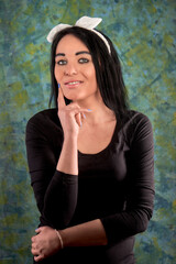 Fototapeta premium Brunette girl and black dress