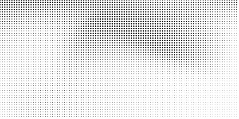 Halftone dotted background. Black dots in modern style on a white background.