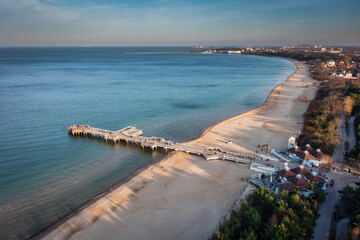 Pier in Brzezno and the beach of the Baltic Sea in Gdansk. Poland