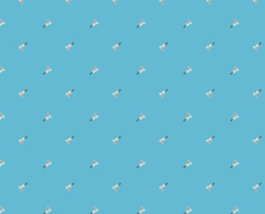 energy saving concept. seamless pattern of led lamps on a blue background.