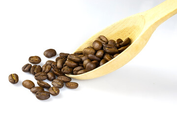 image of coffee beans on a spoon close-up