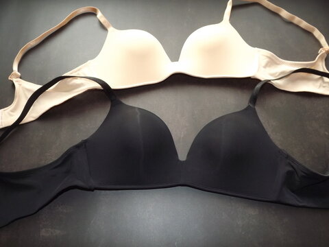 lots of bras in different shapes and colors close up. High quality photo