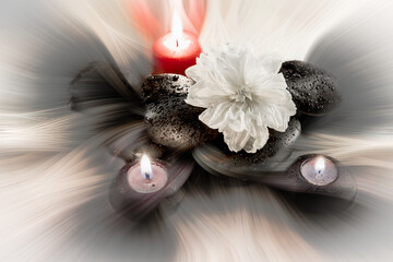 Bougies et galets noirs avec une fleur blanche dans un effet tourbillons.