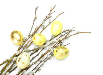 Easter eggs and pussy willow branches isolated on white