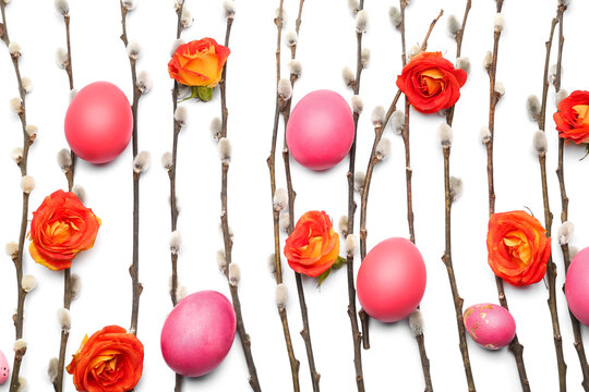 Beautiful roses with painted Easter eggs and pussy willow branches on white background