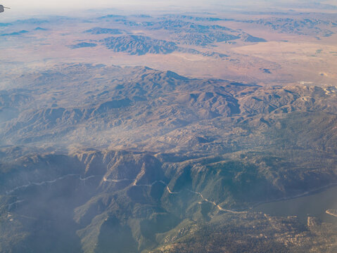 Aerial view of San Bernardino Mountains and Big Bear Lake, view from window seat in an airplane