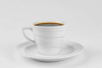Ceramic coffee mug close up. Coffee isolated on a white background. Copy space and free space for text near the drink.
