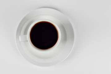 Ceramic coffee mug close up. Coffee isolated on a white background. Copy space and free space for text near the drink.