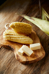 Choclo con queso a typical ecuadorian appetizer that consists of corncob accompanied by fresh...