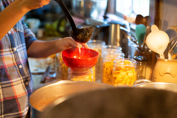 Fototapeta na wymiar Canning apples in a kitchen