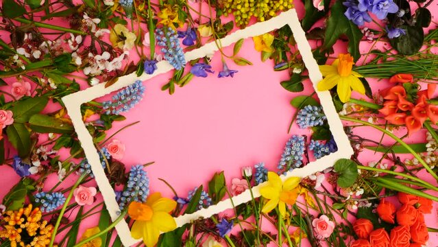 Flat lay spring flowers frame with copy space