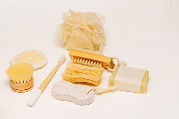 Zero waste concept, sustainable lifestyle. plastic free natural eco bamboo toothbrush,  soap, luffa, brush. Bath accessories made of natural material