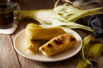 Humitas are savory steamed fresh corn cakes, a traditional Ecuadorian appetizer. It’s accompanied...