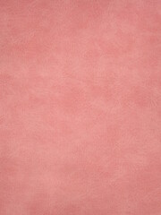 Fototapeta premium pink suede of a non-uniform color as a background. High quality photo