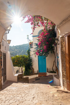 The city gate of Mojacar with white houses on top of the mountain. Costa Blanca in the Mediterranean Sea, Almeria. Spain