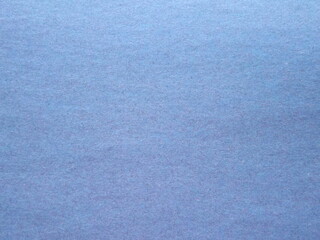 The surface of the gray-blue colored cardboard as a background. High quality photo