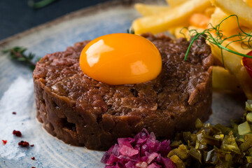 Steak tartare appetizer classic. Grade a Kobe beef mixed with eggs, red onions and capers